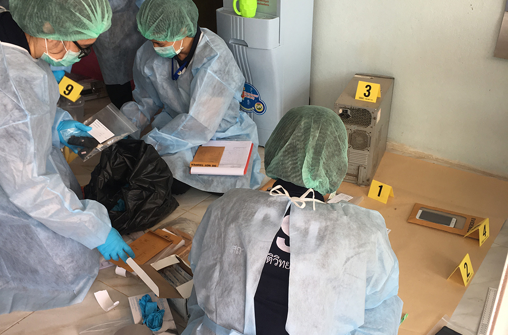 INTEPROL Operation Blackwrist: Officers collect evidence from Salangam’s home.