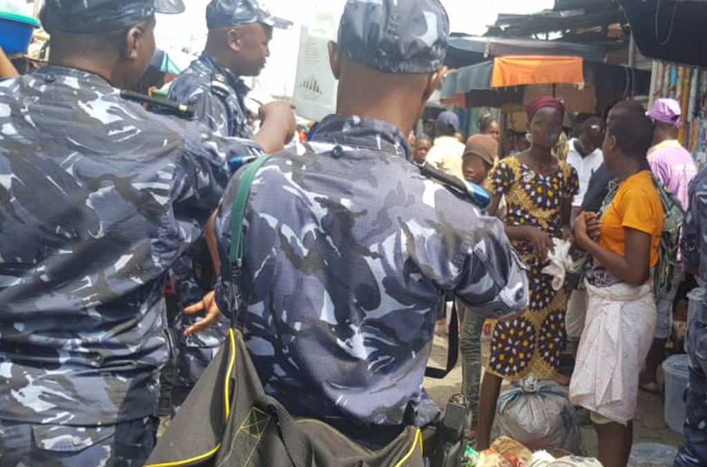 Some 100 officers across Benin and Nigeria carried out raids and identity checks at markets in Abuja and Cotonou.