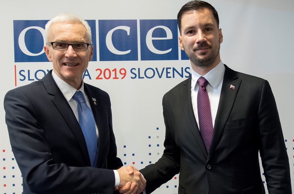 Secretary General Jürgen Stock is greeted by Lukáš Parízek, State Secretary of the Ministry of Foreign and European Affairs of the Slovak Republic
