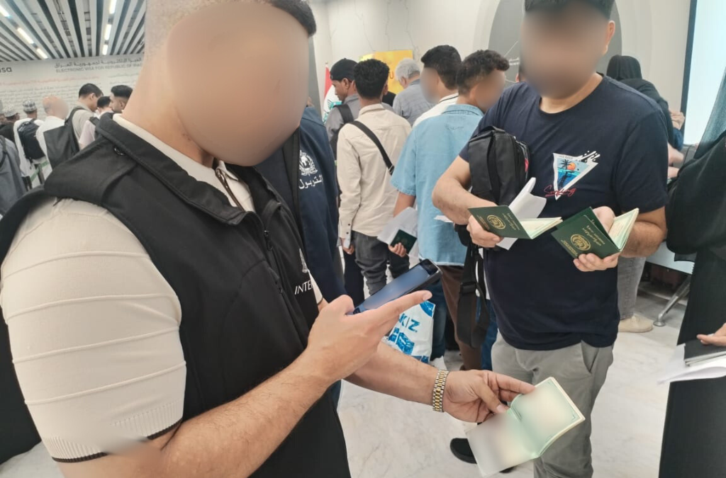 4. Iraq passport check.png