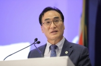 El Presidente de INTERPOL, Kim Jong Yang, subrayó la firme determinación de las fuerzas del orden de todo el mundo.